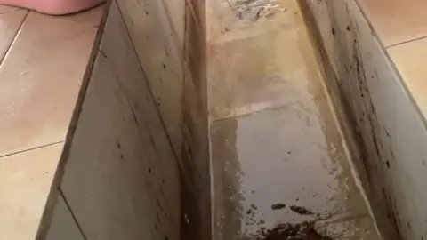 Chinese Girl Catch the Poop in Toilet
