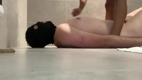 Black guy gets facialized by a tattooed white blonde in bathroom POV